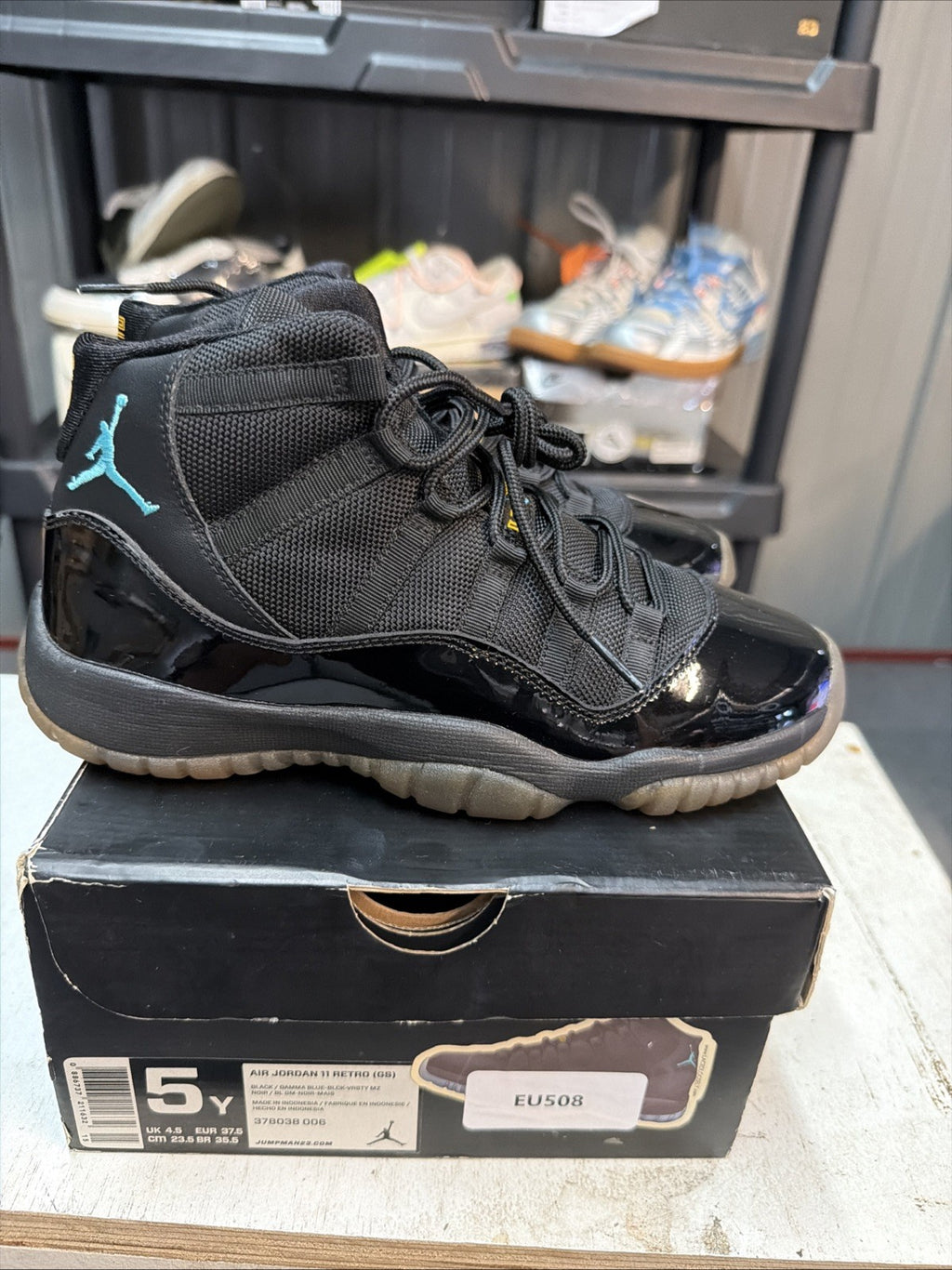 Air Jordan 11 Retro Gamma Blue Sneakers Black Patent Leather