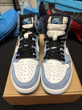 pair of Nike Air Jordan 1 Retro High OG sneakers in the "University Blue 6.5y