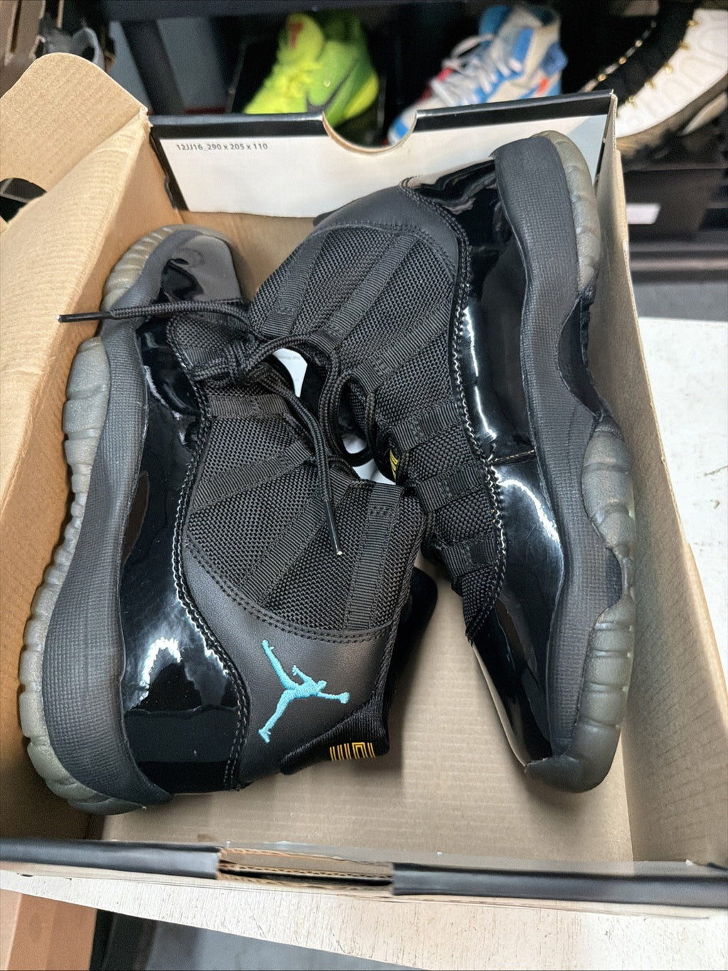 Air Jordan 11 Retro Gamma Blue Sneakers Black Patent Leather