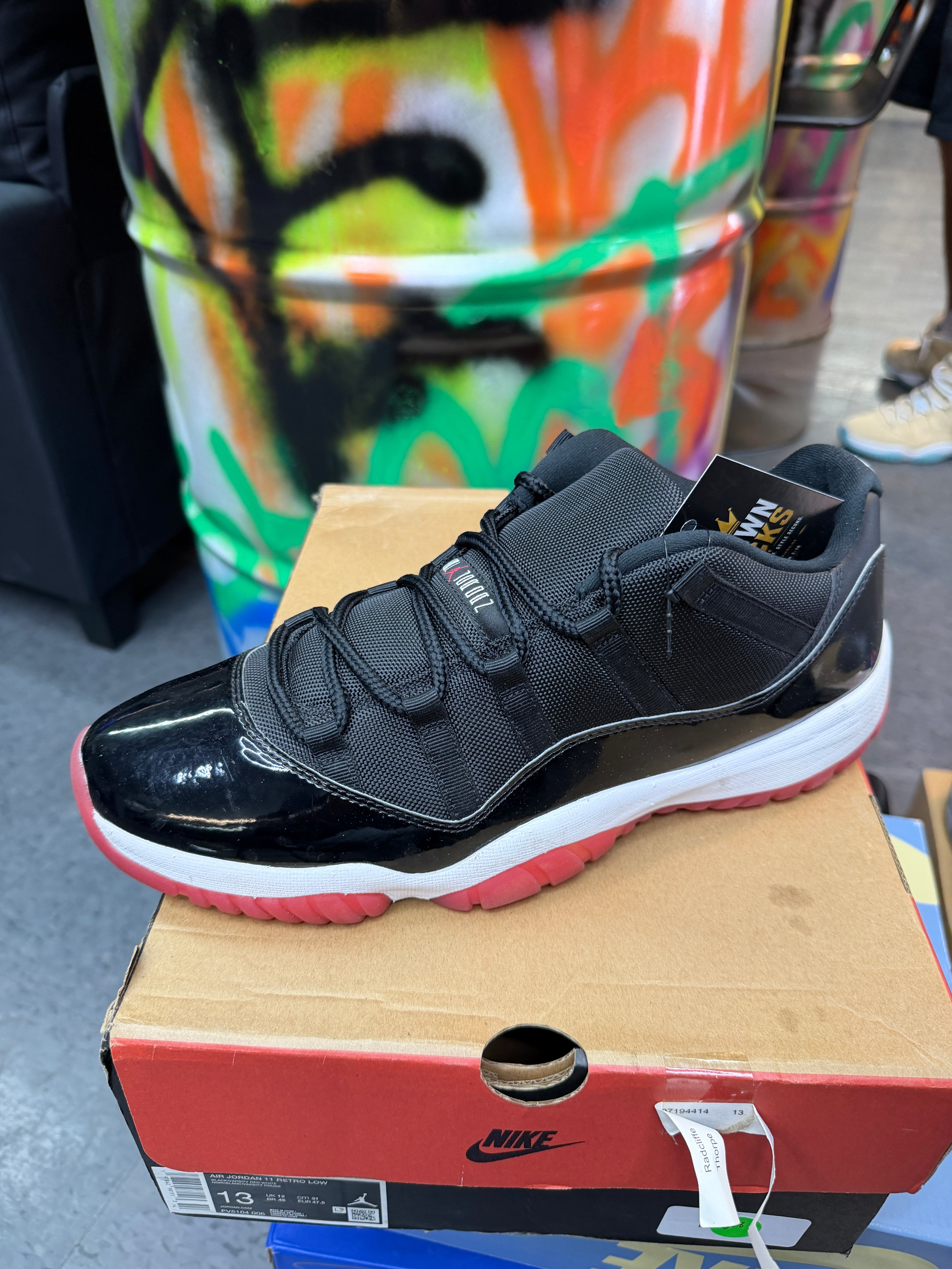 Jordan 11 Low Bred